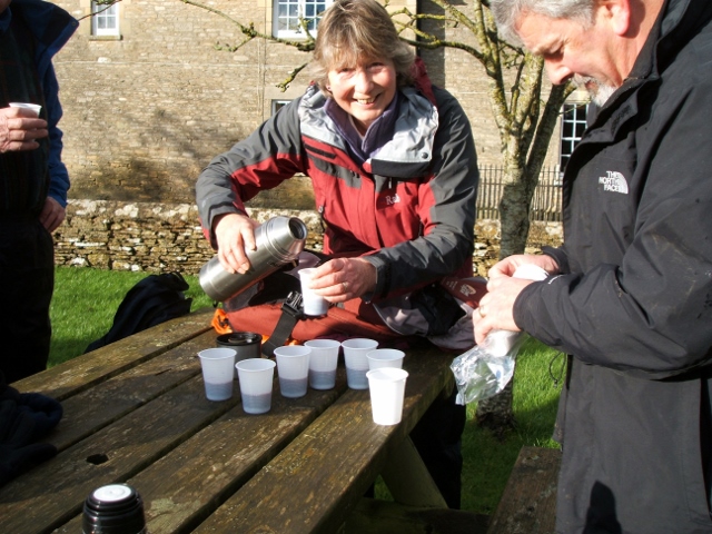 Shirley pours the mulled wine